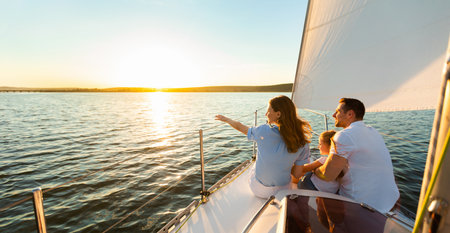 Family Of Three Sailing On Yacht At Seaside Outdoor, Panoramaの写真素材