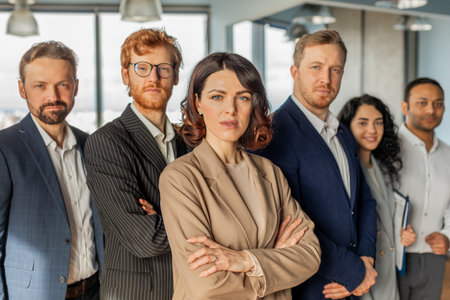 Confident Business Team Posing for Portrait in a Modern Officeの写真素材