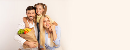 Happy Family of Three Enjoying Grocery Shopping Together