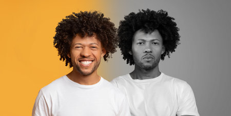 Man Smiling On Yellow Background By Black and White Versionの写真素材