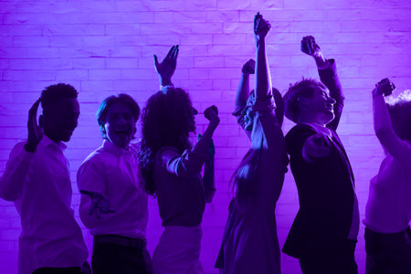 Cheerful Young People Dancing Having Fun At Night Party Indoor