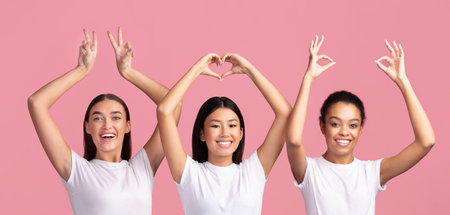 Three Women Posing And Gesturing Signs On Pink Background, Panorama