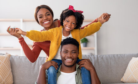 Family Leisure. Happy Black Mom, Dad And Daughter Having Fun At Homeの写真素材