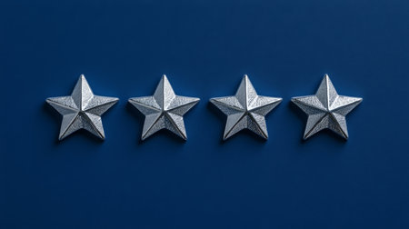 Four silver stars arranged neatly on blue background emphasizing sense of order and designの素材
