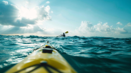 Person Kayaking in Middle of Oceanの素材