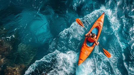 Man Paddling Kayak in Oceanの素材