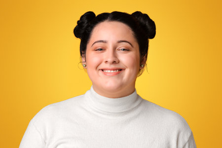 Portrait Of Cheerful Overweight Girl In White Turtleneck Sweaterの写真素材