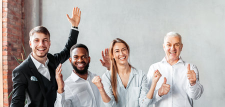 Joyful Coworkers Celebrating Success At Work Gesturing Posing In Office