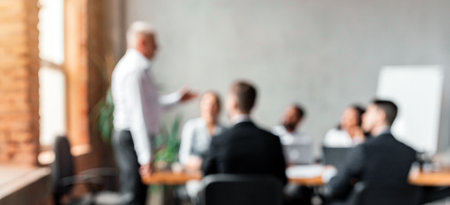 Unrecognizable Businessman Giving Speech During Meeting In Office, Blurred Backgroundの写真素材