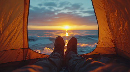 Relaxing at sunset by the ocean from the comfort of a tent after a day of outdoor adventures. Generative AIの素材