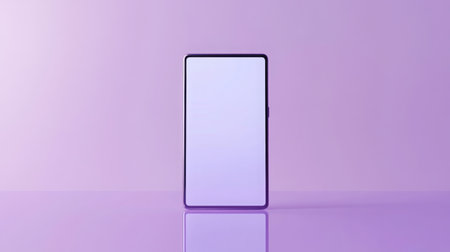 A smartphone with a blank screen sits on a purple surfaceの素材