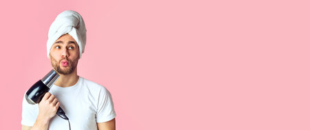 Guy squeezed his lips like a kiss and does hairstyleの写真素材