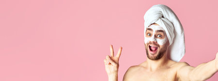 Man with mask on his face shows peace sign