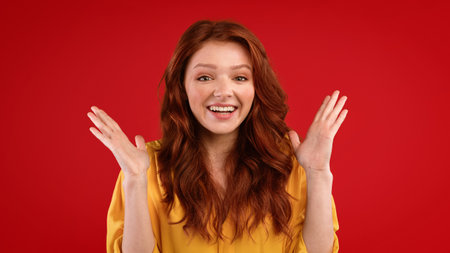 Girl Smiling To Camera Gesturing In Excitement Over Green Background