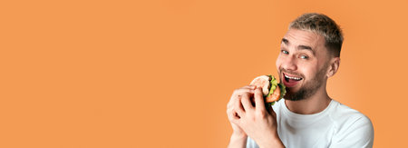 Ridiculous cute man loves fast food, free spaceの写真素材