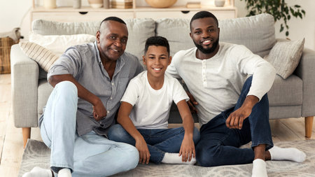 Family Portrait Of Happy Black Boy With Father And Grandfatherの写真素材