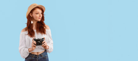 Photographer Girl Holding Retro Photo Camera Over Pink Background, Panoramaの写真素材