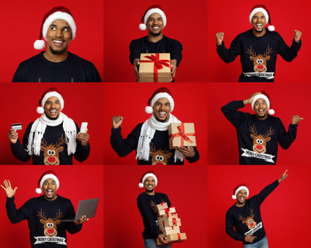 Joyful man celebrating Christmas with gifts against a bright red backgroundの写真素材