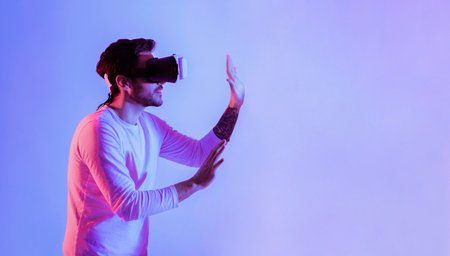 Millennial man in 3D glasses in neon
