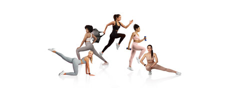 Women engaging in fitness poses showcasing strength and energy in athletic wearの写真素材