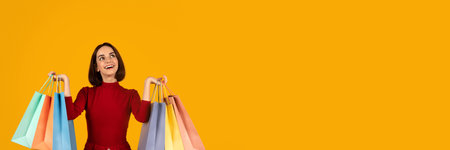 Excited shopper celebrating savings with colorful bags during promotional event