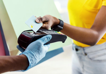 African Woman Paying Courier For Delivery Service At Home, Croppedの写真素材