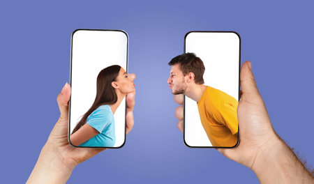 Couple playfully chatting via smartphones in a creative collageの写真素材