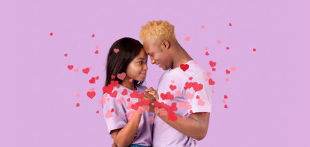 Couple sharing a romantic kiss on Valentines Day surrounded by hearts