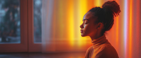 A woman meditates peacefully at home with beautiful light filtering through the window during early evening hours. Generative AIの素材