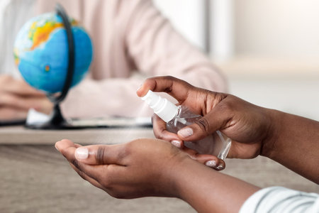 African Family Visiting Travel Agency, Talking With Agent In Officeの写真素材
