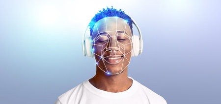 Happy person enjoying music with advanced facial recognition technologyの写真素材
