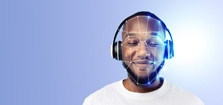 Modern face recognition technology demonstration with a user wearing headphonesの写真素材