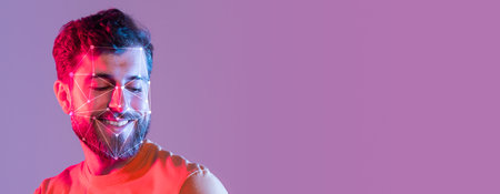 Facial recognition technology on a smiling man against a colorful background
