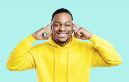 Cheerful African Man Pointing At Forehead Over Blue Background, Panorama