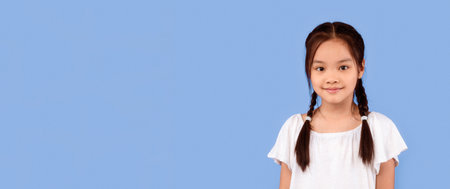 Cute Asian Kid Girl Posing Standing Over Background, Studioの写真素材