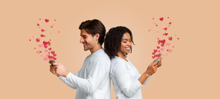 Couple enjoying virtual connection on St. Valentines Day with heart emojisの写真素材