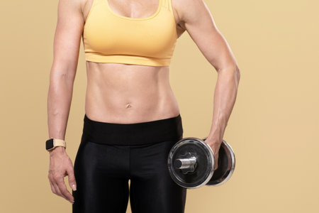 Keep fit, athletic body and strength training at self-isolating during covid-19 lockdown at home or gymの写真素材