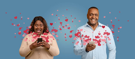 Couple joyfully celebrating love on St. Valentines Day with smartphonesの写真素材