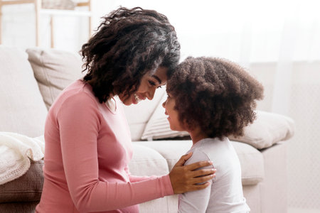 Maternal Warmth. Beautiful Pregnant Woman Bonding With Toddler Daughter At Homeの写真素材