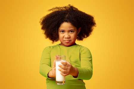 Lactose Intolerance. Little Girl Rejecting To Drink Milkの写真素材