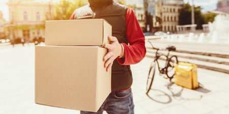 Unrecognizable Courier Delivering Packages And Food Outdoors, Cropped, Panoramaの写真素材