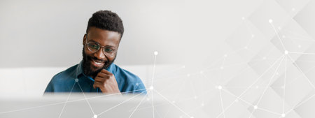 Young African American businessman focused on success in the officeの写真素材