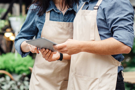 Plant, modern app, sale, lifestyle and store. Busy millennial man and female