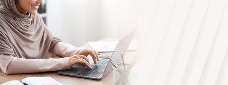 Smiling Arabic Woman Working On Laptop For New Project In Office