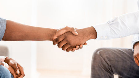 Gratitude For Help. Unrecognizable Couple And Family Psychologist Shaking Hands After Successful Therapy And Reconciliation In Office. Cropped, Selective Focusの写真素材