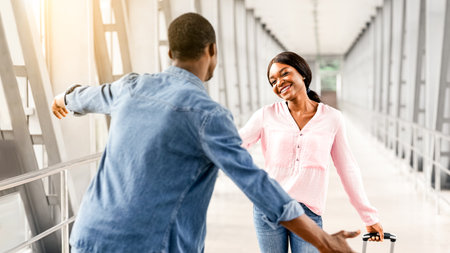 Happy African American Woman Meeting With Boyfriend In Airport Terminal After Arrival