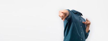 Collage of headless figures in a secluded, creative environmentの写真素材