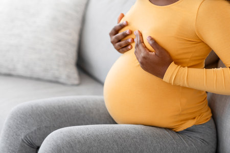 Pregnant woman having painful feelings in breastの写真素材