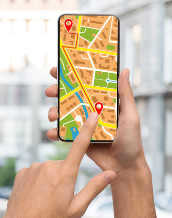 GPS Navigation System App Opened On Smartphone In Male Hands