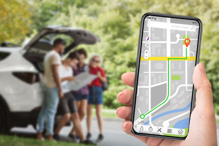 Closeup of woman using smart phone with gps app